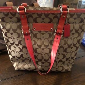 Women’s Orange medium size Coach Purse